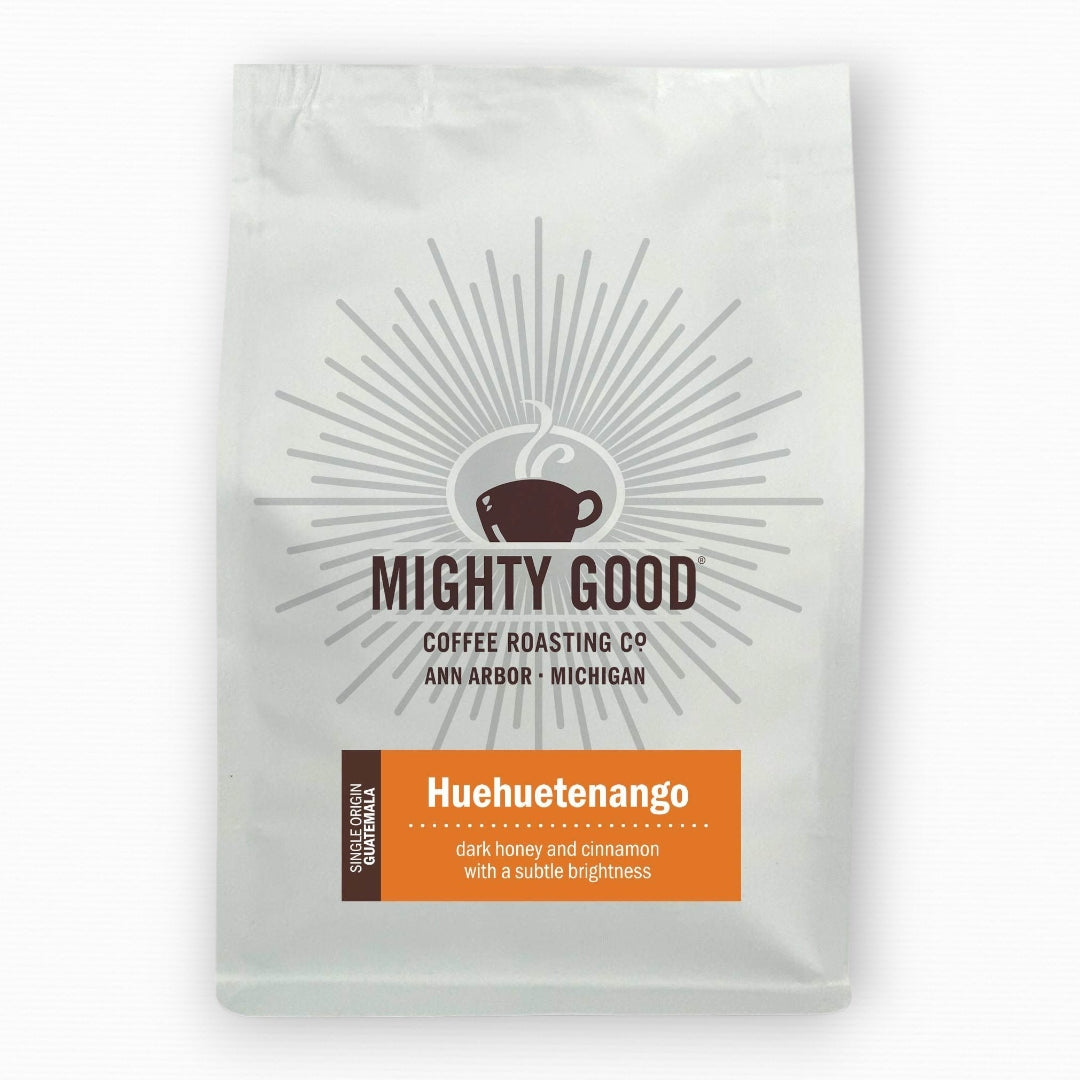 Mighty Good Coffee Huehuetenango 12oz bag – single origin Guatemalan coffee with tasting notes of dark honey, cinnamon, and a subtle brightness. Specialty coffee roasted in Ann Arbor, Michigan by Mighty Good Coffee Roasting Co.
