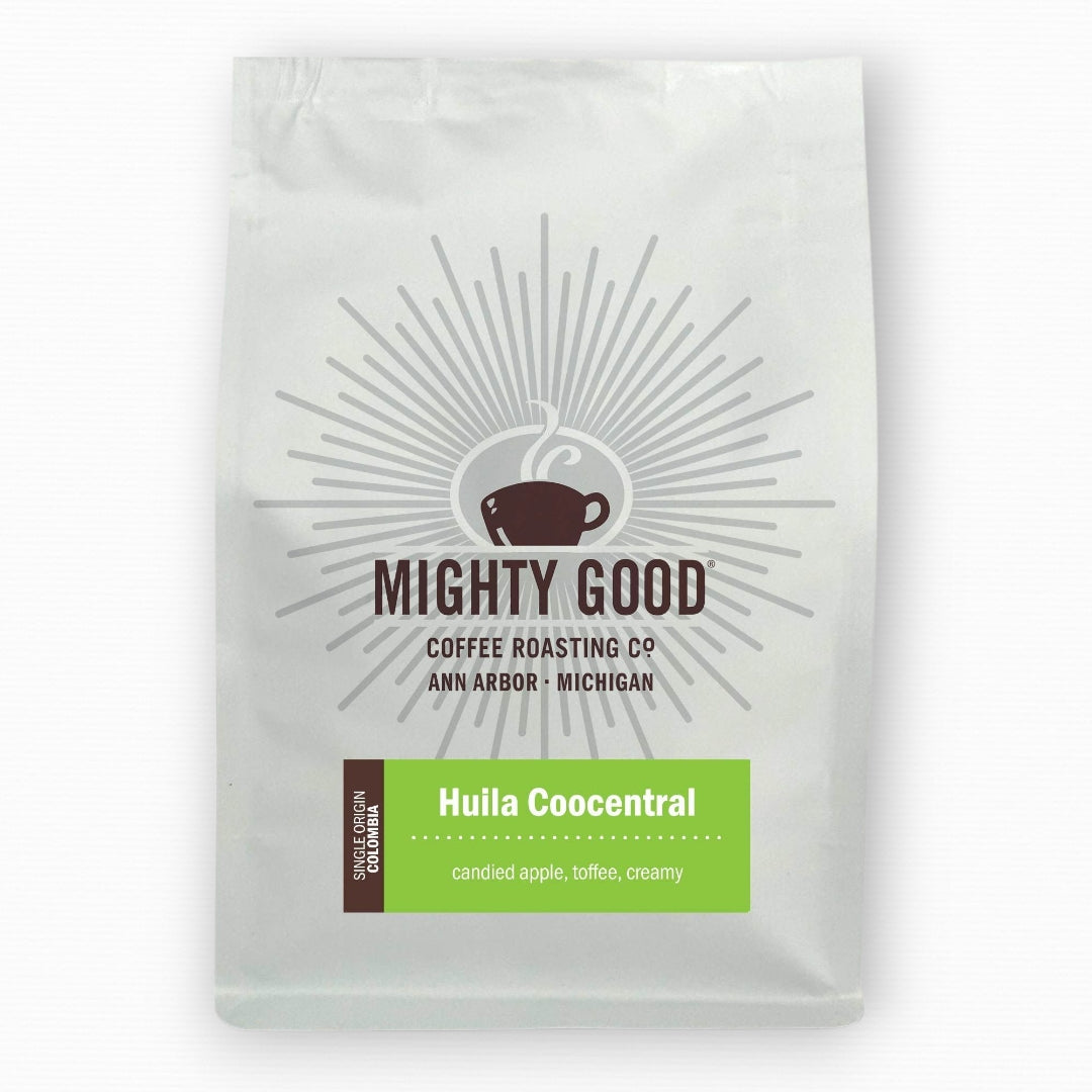 Mighty Good Coffee Huila Coocentral 12oz bag – single origin Colombian coffee with tasting notes of candied apple, toffee, and creamy body. Specialty coffee roasted in Ann Arbor, Michigan by Mighty Good Coffee Roasting Co.
