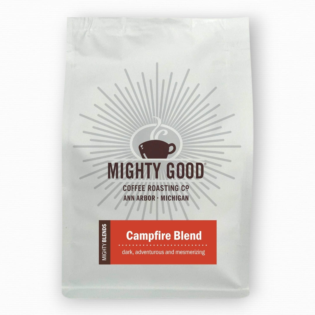 “Mighty Good Coffee Campfire Blend 12oz bag – a dark, adventurous, and mesmerizing specialty coffee blend roasted in Ann Arbor, Michigan by Mighty Good Coffee Roasting Co.